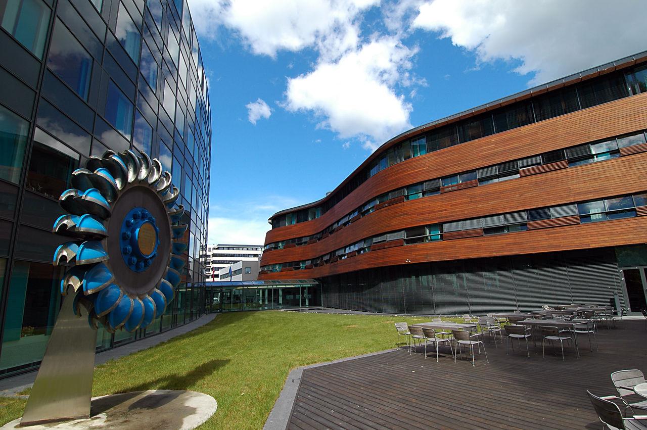 Office buildings with decorative turbine outside